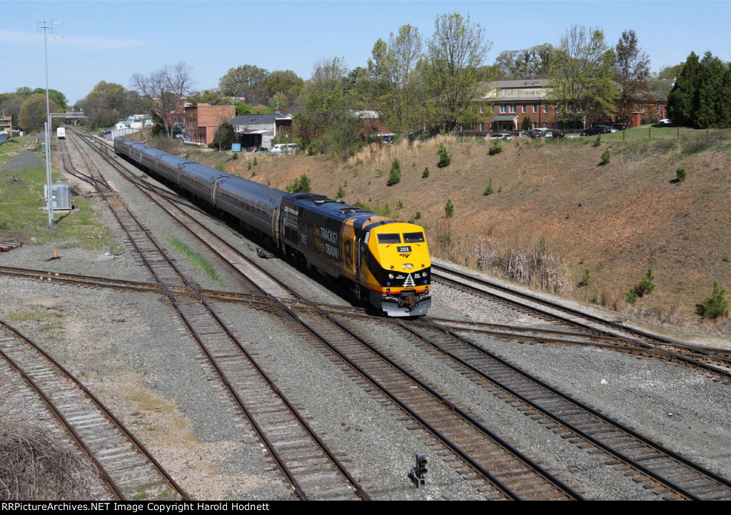 AMTK 203 leads train P080-04 across Boylan Jct